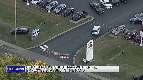 Suspect shot by police after alleged assault, stabbing at suburban car dealership