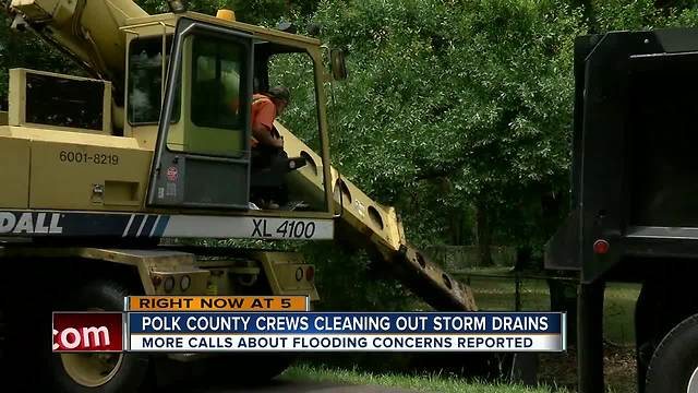 Polk County crews cleaning out storm drains