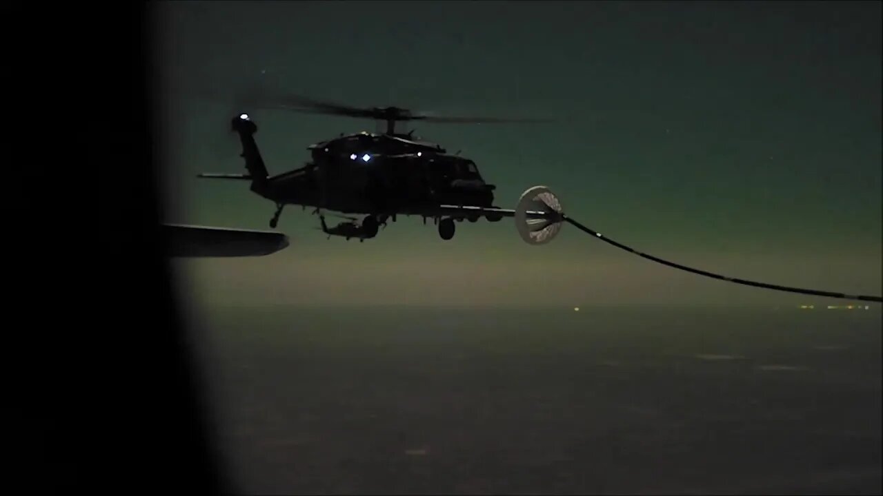 HC-130J Combat King II Refuels HH-60G Pave Hawk Helicopters