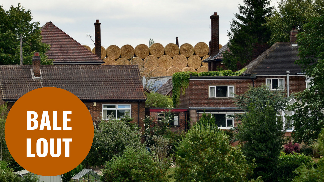 Villagers furious after farmer dumps 30ft high stacks of hay bales outside their homes