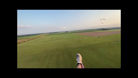 Paramotor solo landing with an instructor talking you down for a perfect landing