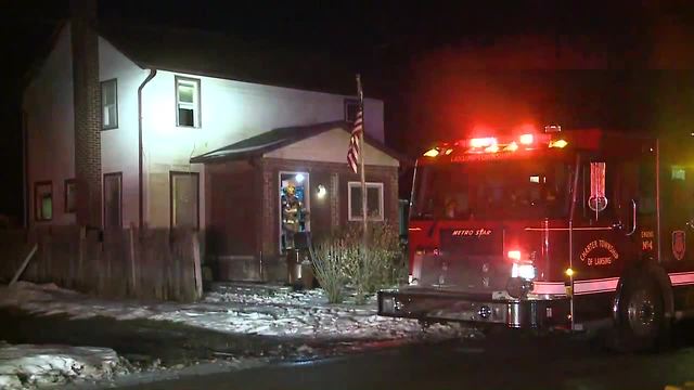 3 people, some pets safe after early morning house fire in Lansing Township