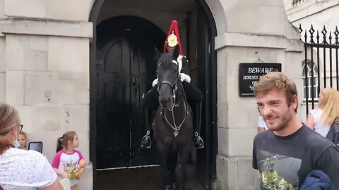 Armed police stand around the to Horse stop tourists approaching 10 September 2022