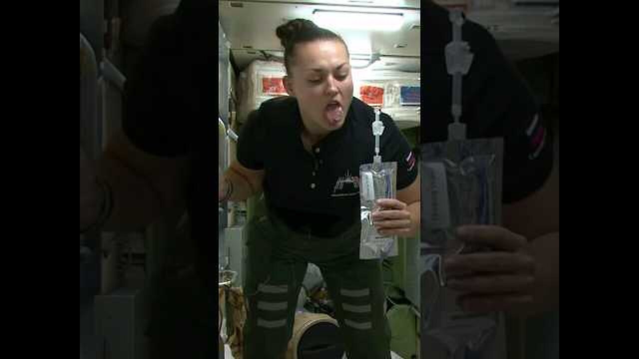 Drinking water in space|astronaut drinking water in space