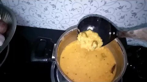 Heating Dhal (Lentil) Curry in Kandy