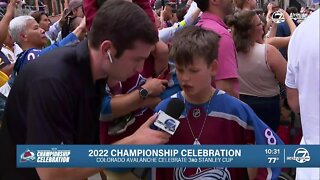 Kids enjoying their first Avs' Stanley Cup win parade