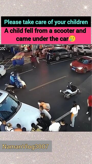A child lost balance on a scooter and came to rest beneath an automobile.🥲