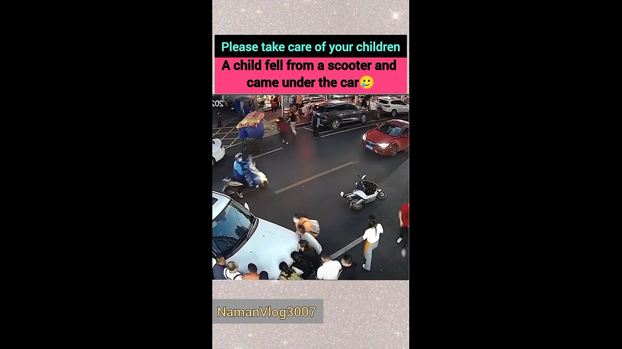 A child lost balance on a scooter and came to rest beneath an automobile.🥲