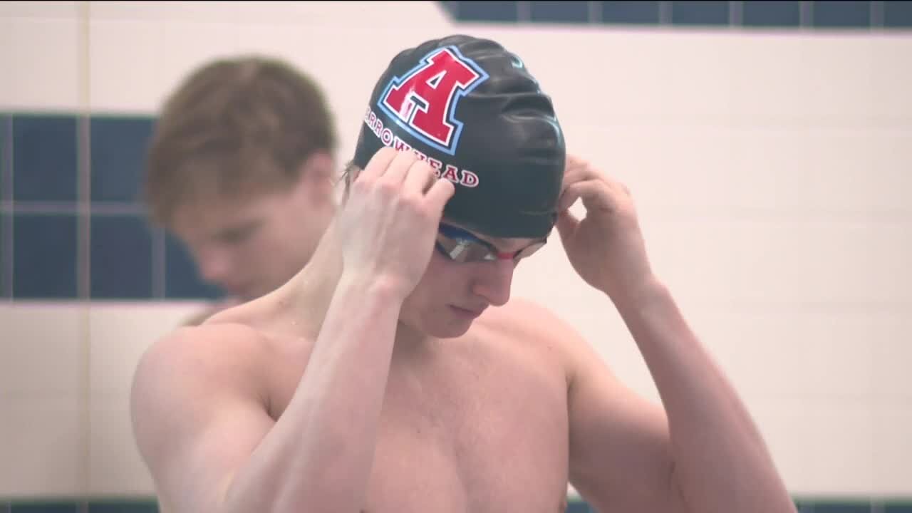 Arrowhead's Lance Johnson swims to make state history