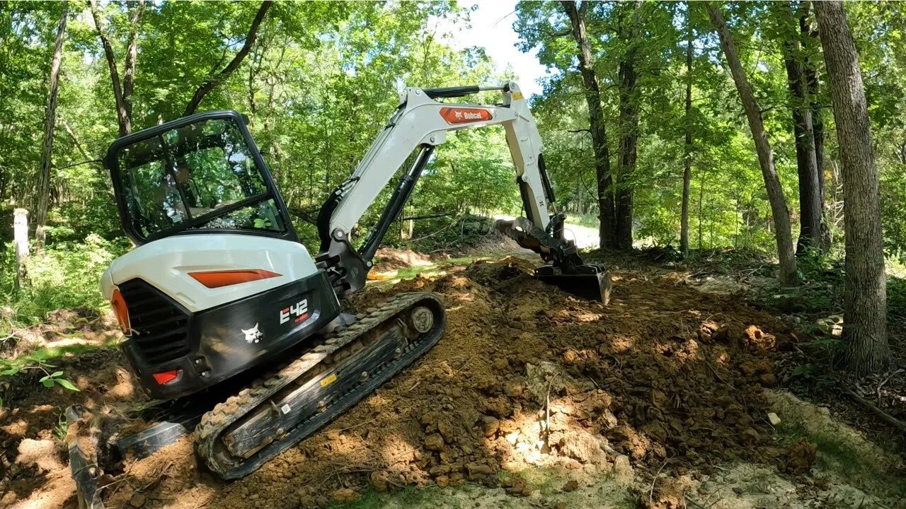 Fast Forward Friday! Time lapse videos building remote campsite with mini excavator