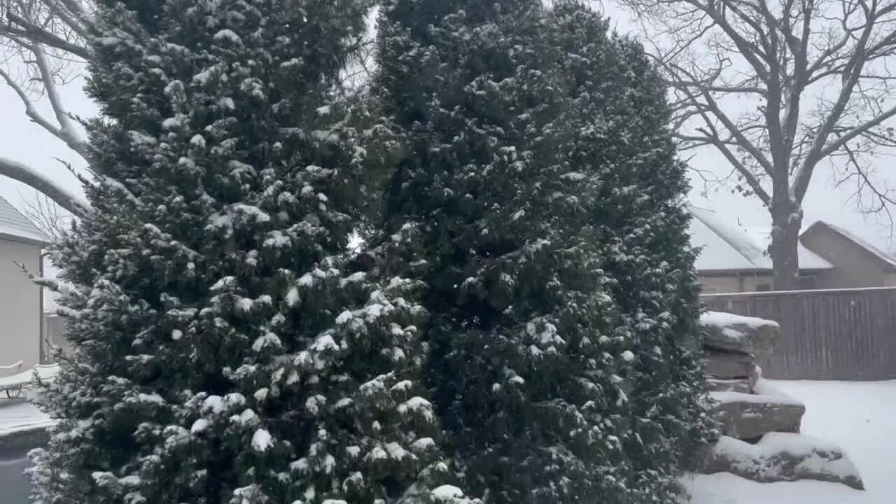 Snow falling in Jenks on Friday morning