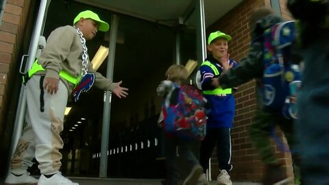 Lockport fourth-grader greets kindergarteners with a high-five each morning