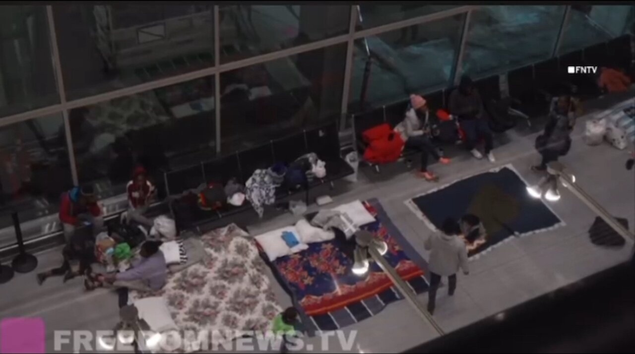 Migrants in Boston Airport are now sleeping on the floor