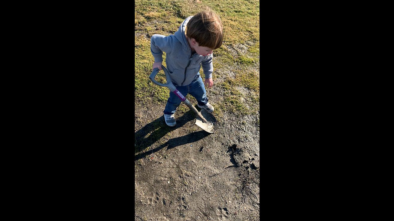 2 year old digging like a man