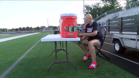 Brookfield East football manager embraces her 'normal' living with alopecia