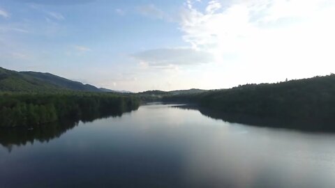 mirror like river in the jungle