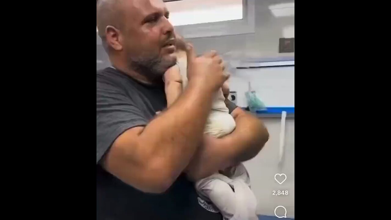 A Palestinian father was filmed giving his daughter a final hug after she was killed in an lsraeli
