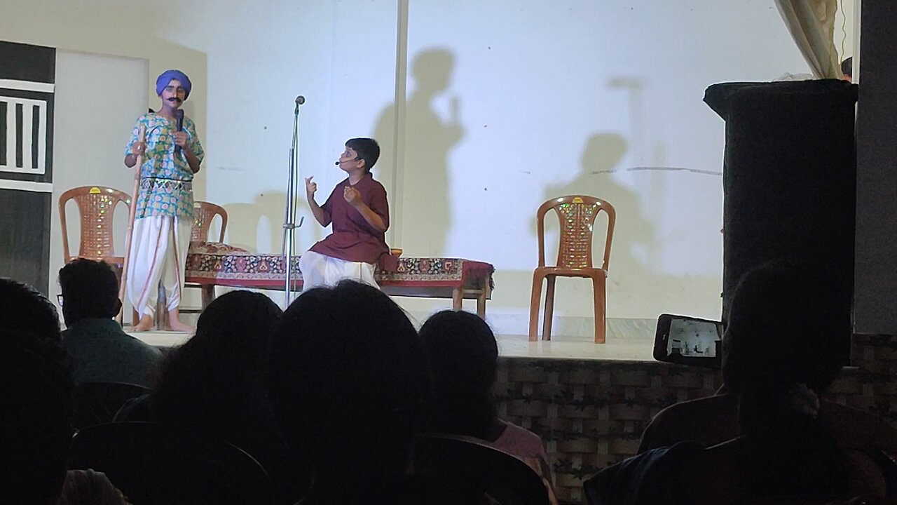 Ankan performing to play a role of pohori natak "Dakghar ".