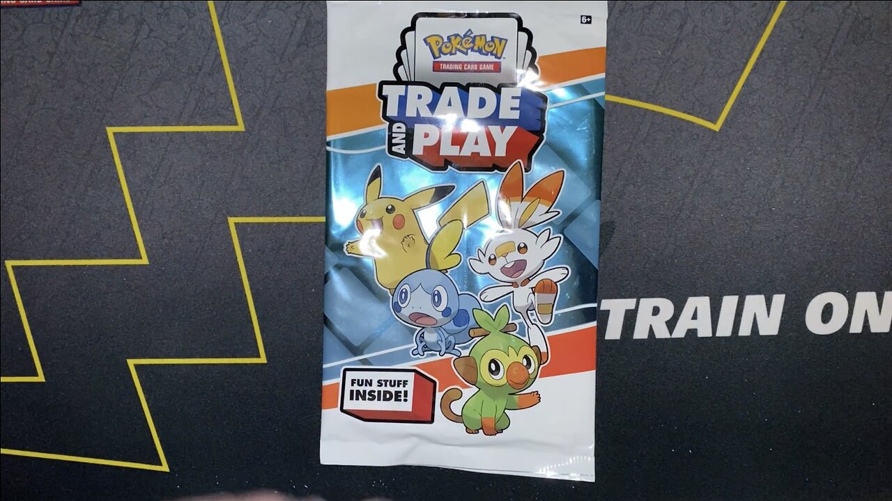 Opening a Pokemon Trade and Play Promo Pack from GameStop!