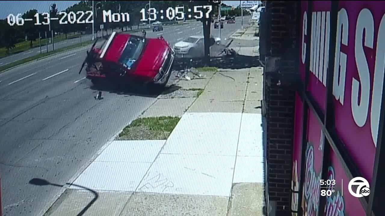 Caught on video: Wrong-way truck plows into building on Woodward after hitting car