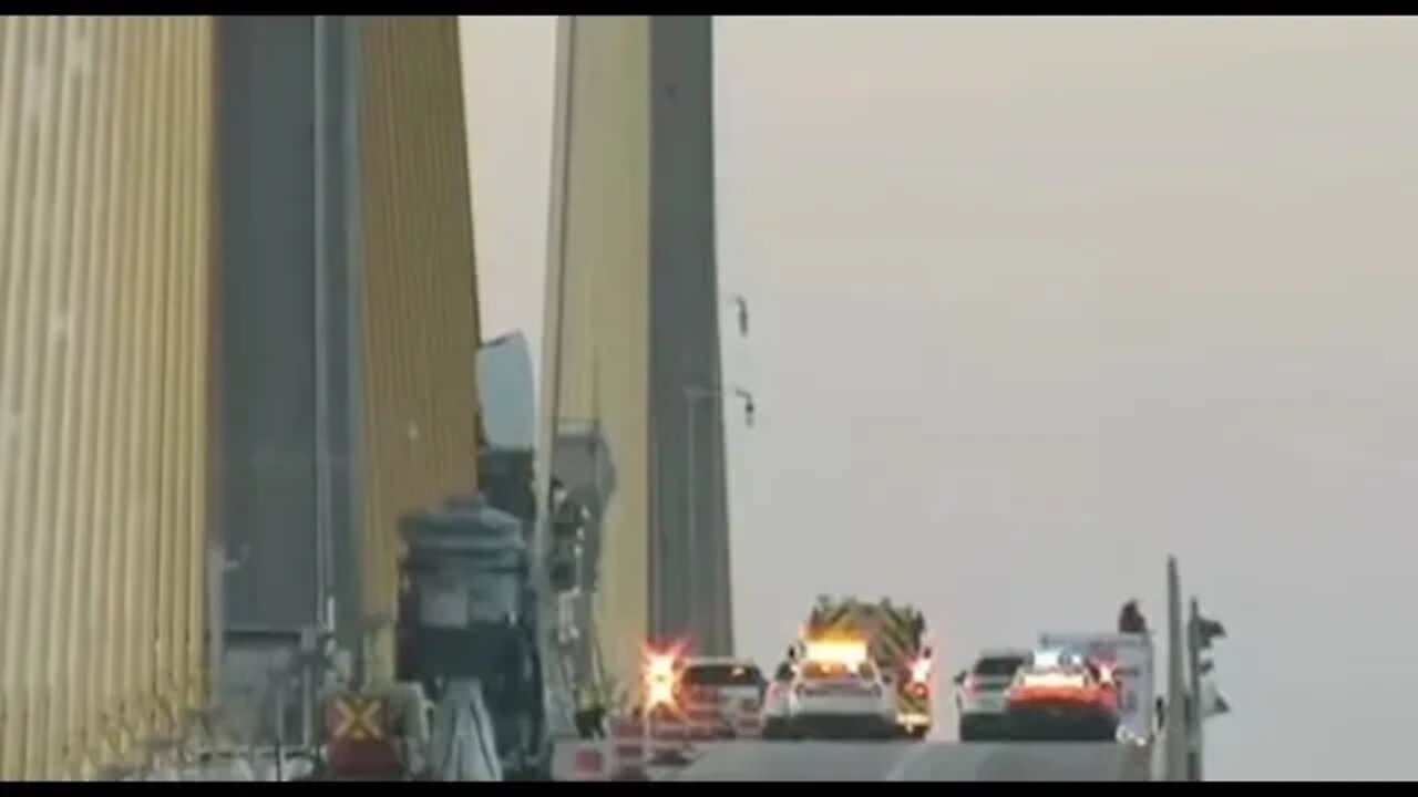 Live: Person on top of Sunshine Skyway Bridge