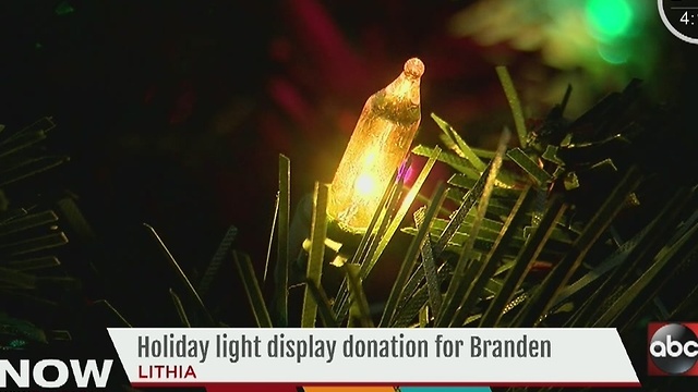 Holiday light display donation for Lithia family