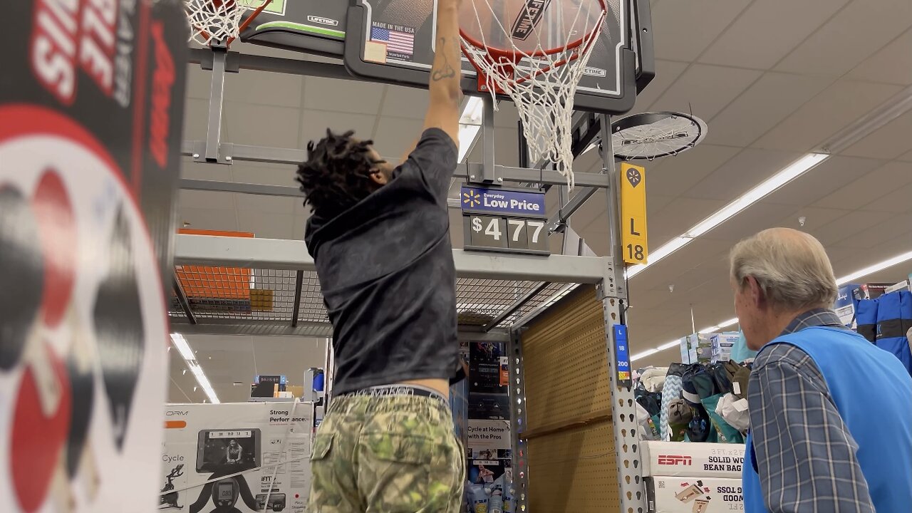 Teaching Walmart employee to dunk