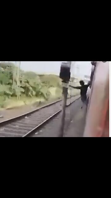 INDIAN GUY DIES AS HE WAS DANGLING OUT OF A TRAIN HIT BY A TRAIN POST