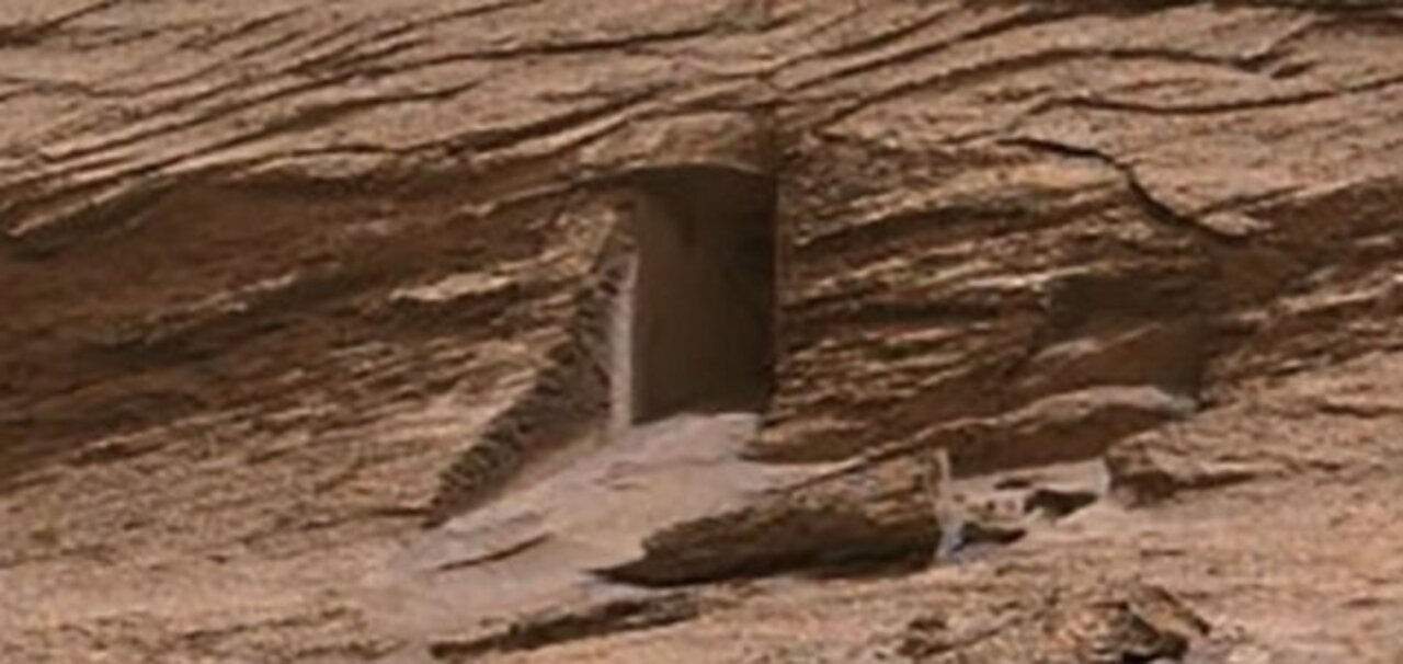 Unexplained Mysteries says Mars doorway is... one foot high