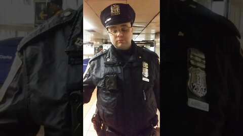 The Police writing me a ticket in Grand Central subway station.