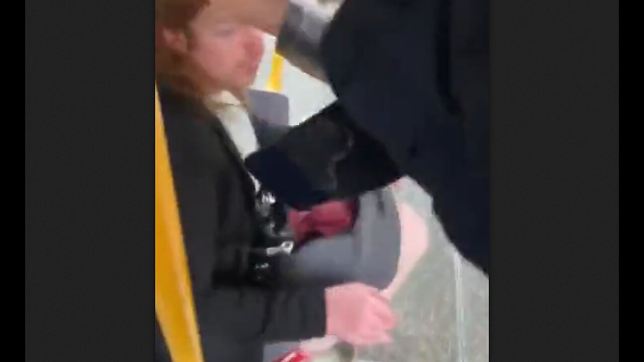 Troon keeps trying to touch a man's shoes on public transport. Wait for it