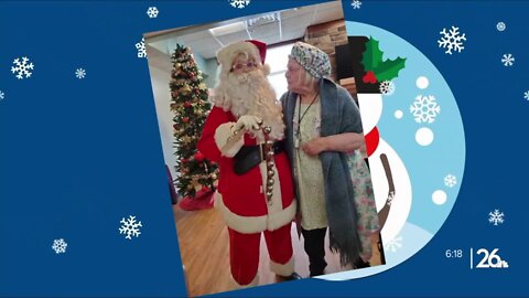 A Neenah crossing guard shows her holiday spirit