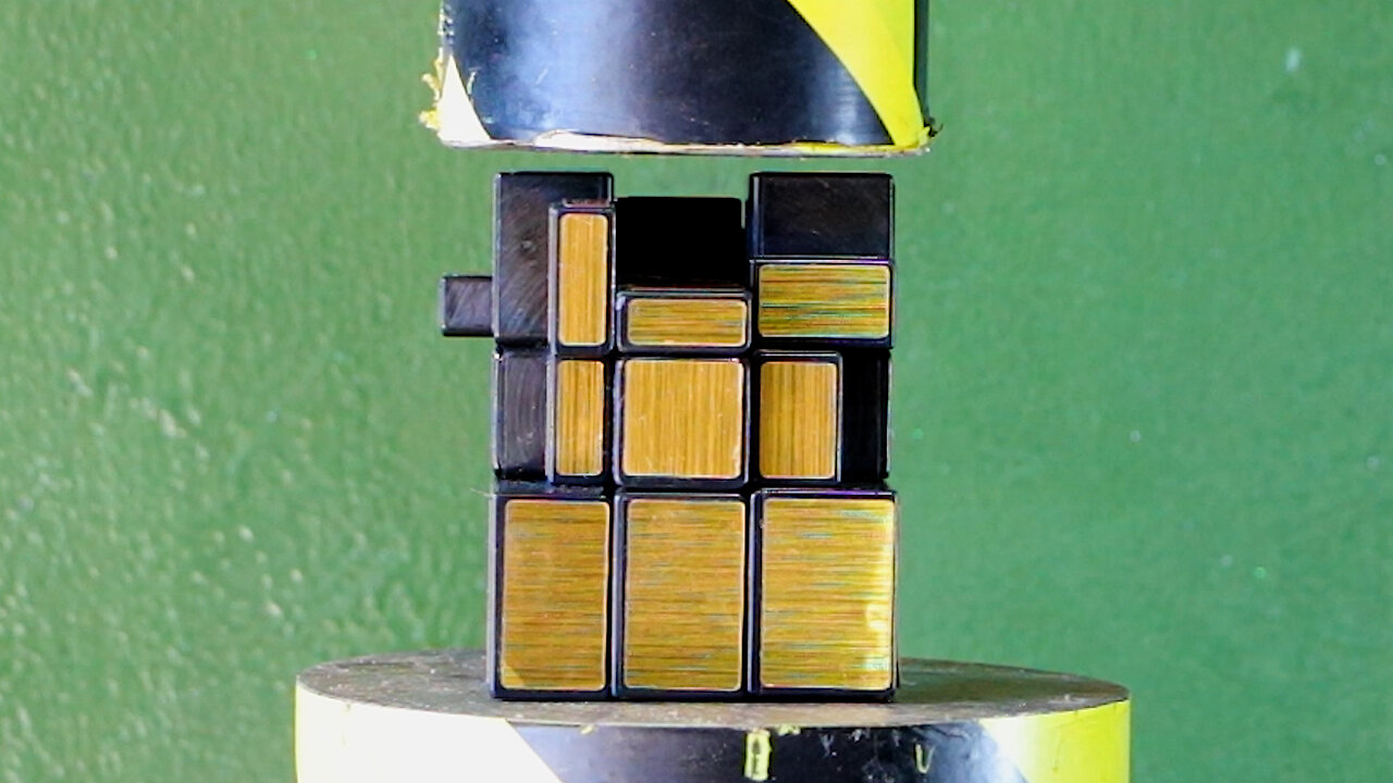 Crushing a Rubik's Cube with a Hydraulic Press