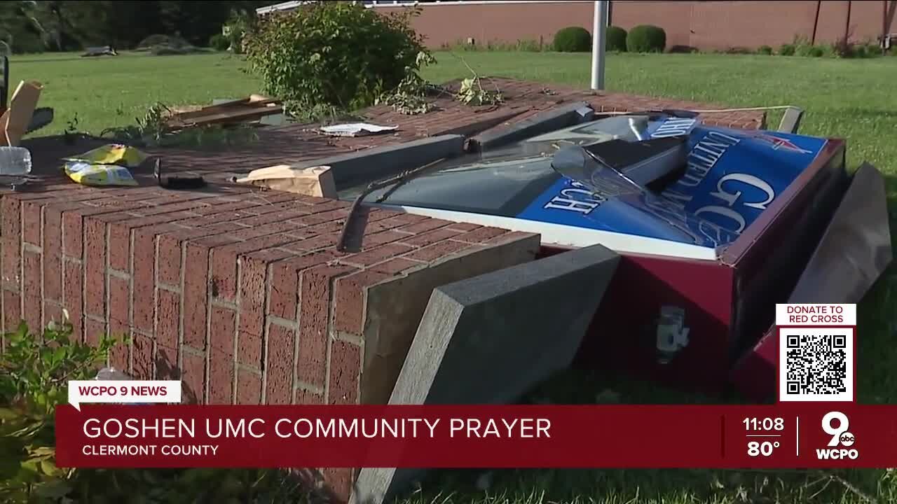 Goshen community members help one another pick up damage after tornado