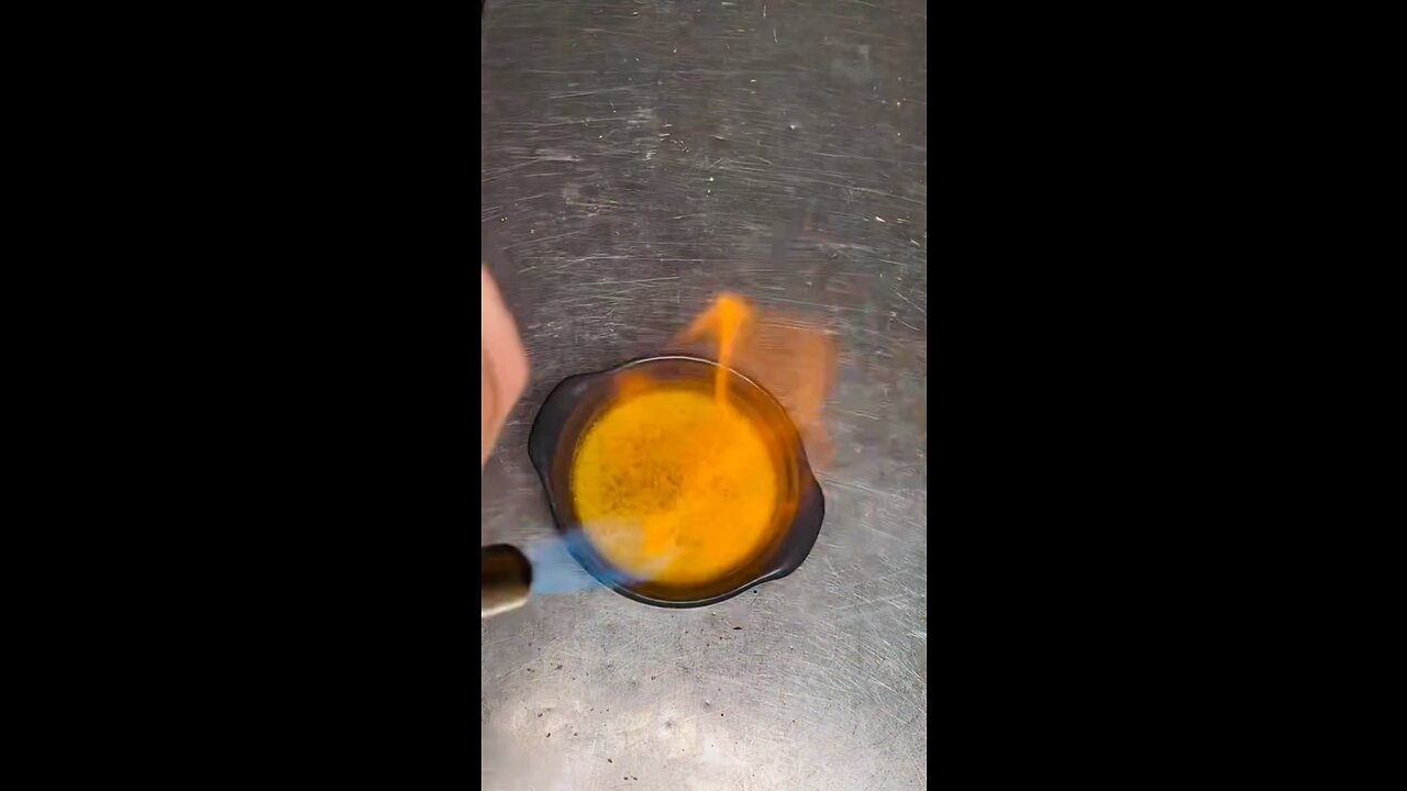 Torching Creme Brûlée (burnt cream)