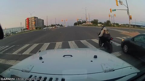 Motorcycle Runs Red Light