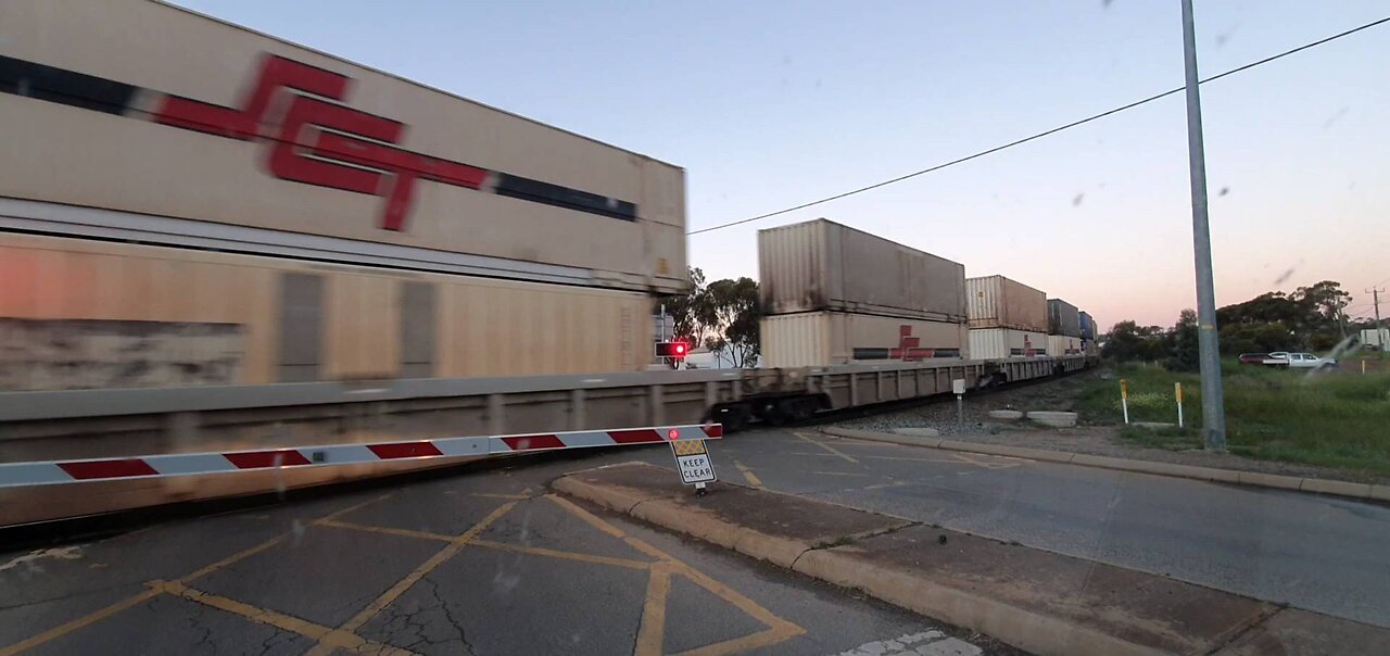 Super long two engine-locomotive Australian freight train passing through Northam, Western Australia