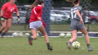 Dwyer soccer playing in memory of their head coach