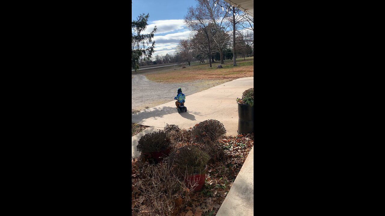 Just a boy riding his Harley
