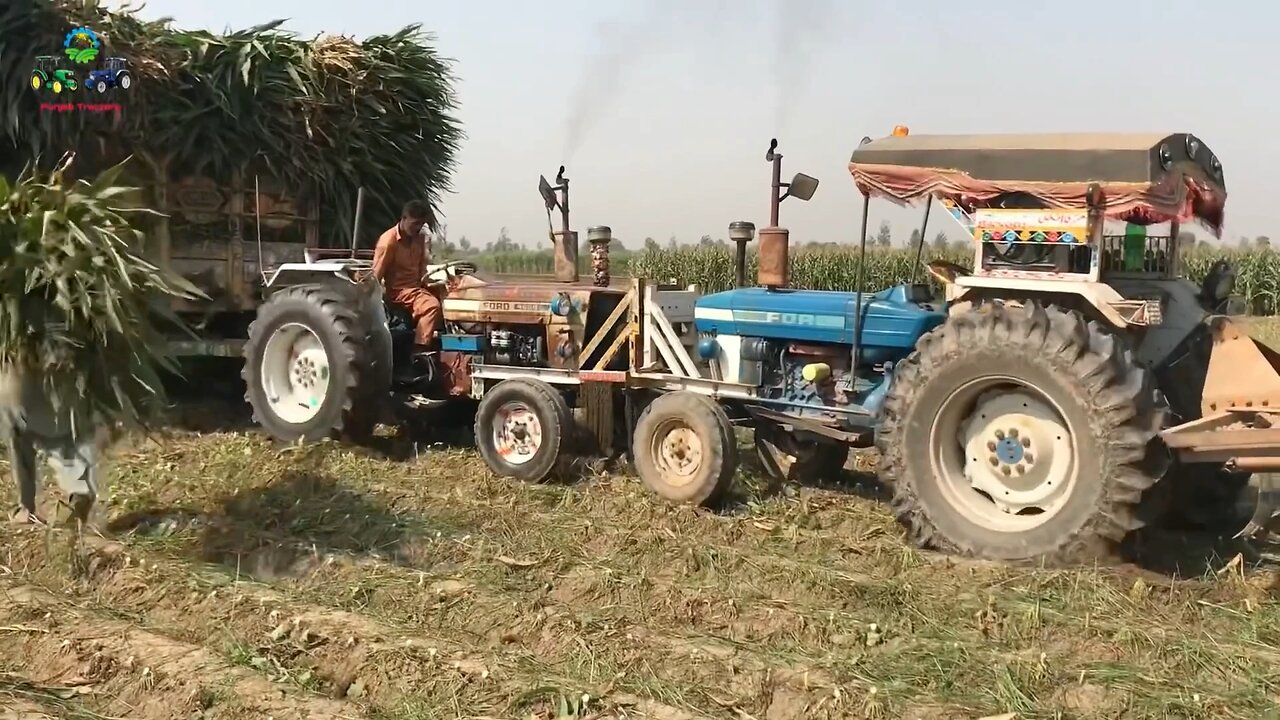 Farming Videos | Ford Tractors 4600 and 4610 Pull Stuck Trailer