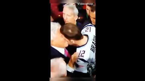 Tom Brady sharing a passionate kiss from Robert craft