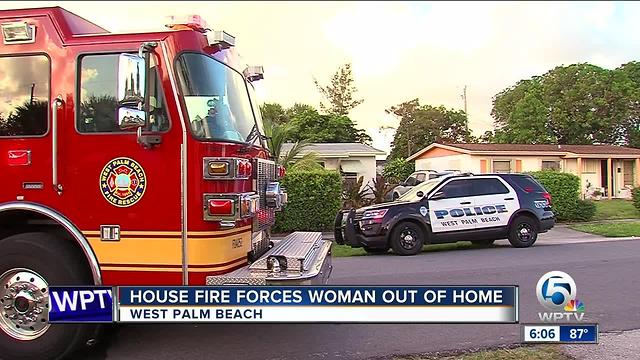 Fire forces woman out of home in West Palm Beach