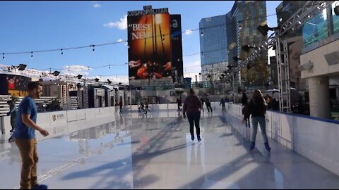 People skating on top of the Cosmopolitan in Las Vegas.