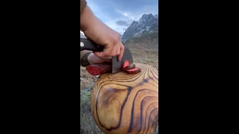 Black Sea Adventurer Cooking Burgars on Mountain.