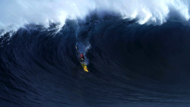 Surfers Test Their Mettle Against 12 Metre Hawaiian Waves