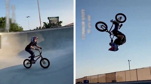 Kid Performs Backflip Barspin While Riding Bike