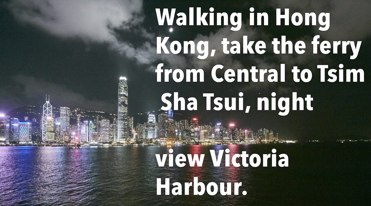 Walking in Hong Kong,Central to Tsim Sha Tsui, night view Victoria Harbour.