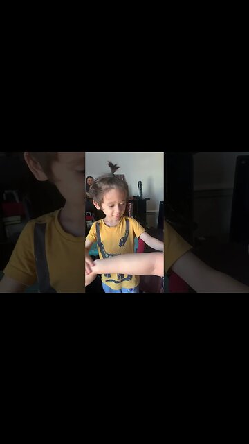 Cute baby boy puts lotion on mommy