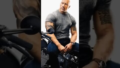 Dwayne Johnson more than muscles glistening with sweat, he also has charm and charisma