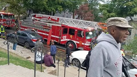 Boston fire department respond to a four alarm fire in Dorchester